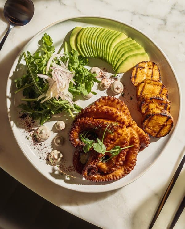 Charred octopus with avocado and sweet potato