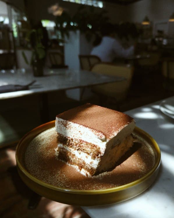 House tiramisù dusted with cocoa